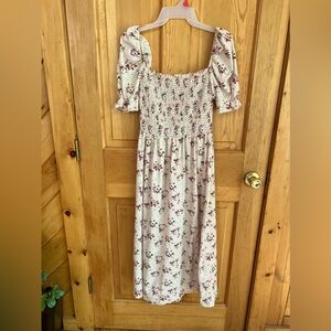 Pink floral smocked midi dress